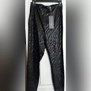Black animal print faux leather leggings